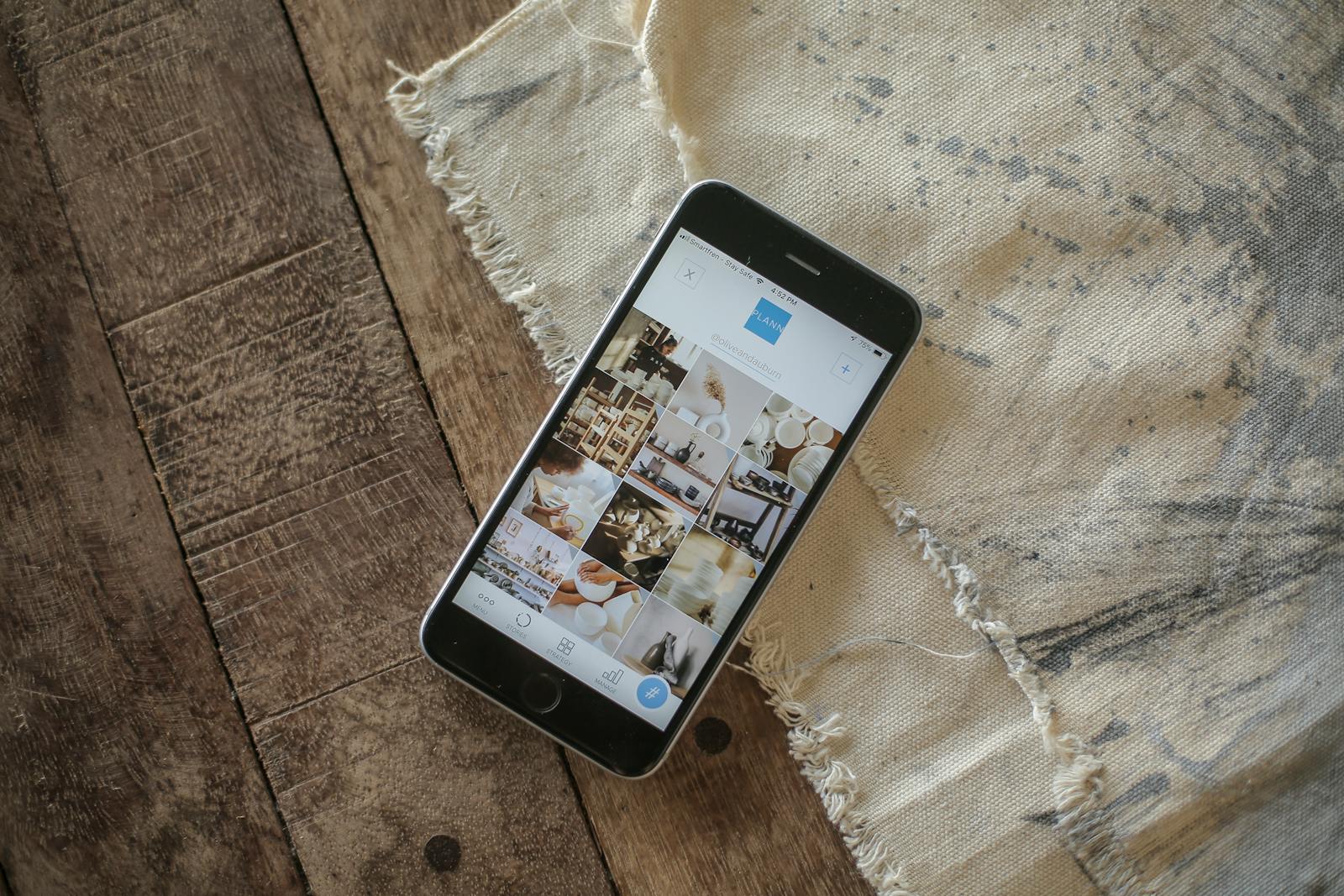 Smartphone displaying photos used as article artwork.